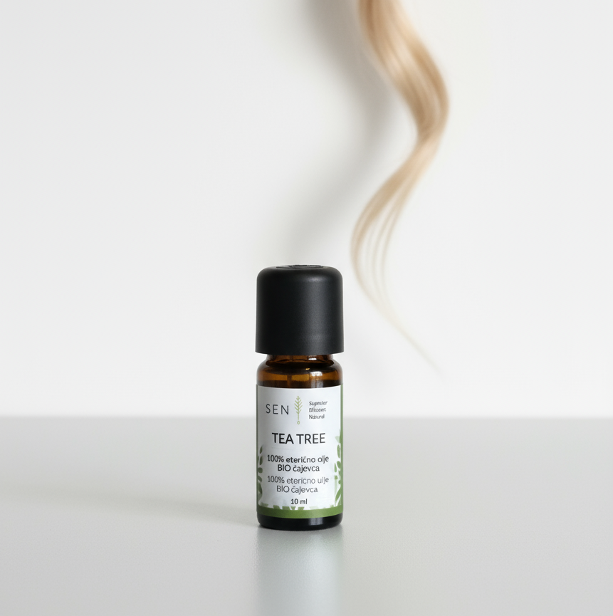 olje cajevca, svetel pramen las v ozadju